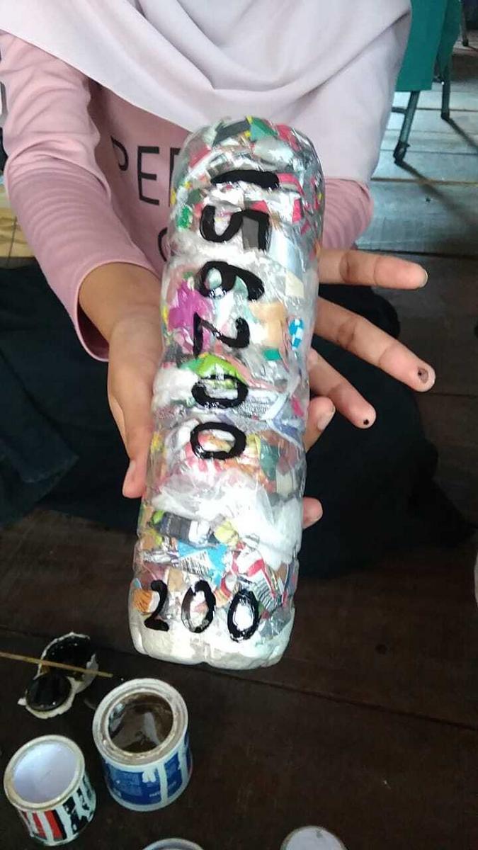 Find a smooth, flat surface (i.e large tile)